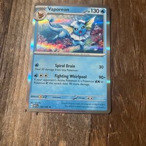 Pokemon Vaporeon Trading Card - Blue and Silver